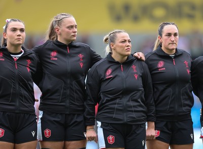 300825 - Canada v Wales, Women’s Rugby World Cup - Left to right, Bryonie King, Tilly Vucaj, Kelsey Jones and Courtney Keight of Wales line up for the anthems