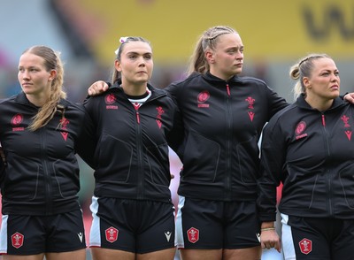 300825 - Canada v Wales, Women’s Rugby World Cup - Left to right, Carys Cox, Bryonie King, Tilly Vucaj and Kelsey Jones of Wales line up for the anthems