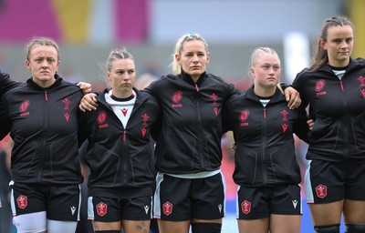 300825 - Canada v Wales, Women’s Rugby World Cup - Left to right, Lleucu George, Keira Bevan, Kerin Lake, Seren Lockwood and Branwen Metcalfe of Wales line up for the anthems