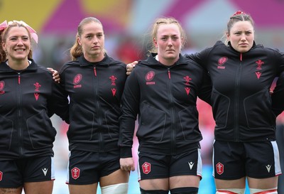 300825 - Canada v Wales, Women’s Rugby World Cup - Left to right, Georgia Evans, Lisa Neumann, Abbie Fleming and Gwen Crabb of Wales line up for the anthems