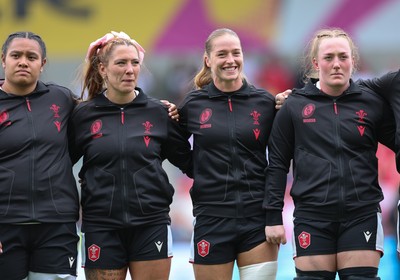 300825 - Canada v Wales, Women’s Rugby World Cup - Left to right, Sisilia Tuipulotu, Georgia Evans, Lisa Neumann and Abbie Fleming of Wales line up for the anthems