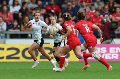 300825 - Canada v Wales, Women’s Rugby World Cup - Keira Bevan of Wales and Jasmine Joyce-Butchers of Wales set up an attack