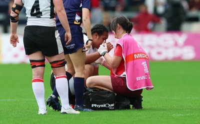 300825 - Canada v Wales, Women’s Rugby World Cup - Gwennan Williams, Wales Women team doctor treats Sisilia Tuipulotu of Wales