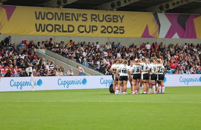 300825 - Canada v Wales, Women’s Rugby World Cup - The Wales team huddle up during the match
