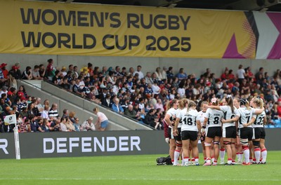 300825 - Canada v Wales, Women’s Rugby World Cup - The Wales team huddle up during the match