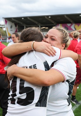 300825 - Canada v Wales, Women’s Rugby World Cup - Kelsey Jones of Wales with Nel Metcalfe of Wales at the end of the match