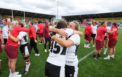 300825 - Canada v Wales, Women’s Rugby World Cup - Kelsey Jones of Wales with Nel Metcalfe of Wales at the end of the match
