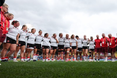 300825 - Canada v Wales, Women’s Rugby World Cup - The Wales team huddle up at the end of the match