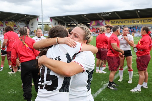300825 - Canada v Wales, Women’s Rugby World Cup - Kelsey Jones of Wales and Nel Metcalfe of Wales at the end of the match
