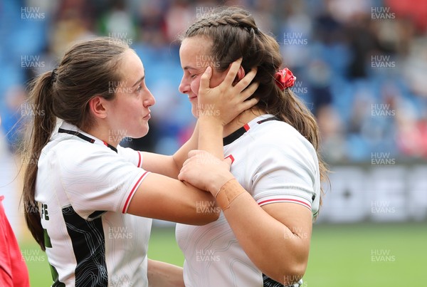 300825 - Canada v Wales, Women’s Rugby World Cup - Nel Metcalfe of Wales congratulates sister Branwen Metcalfe of Wales on her first cap at the end of the match