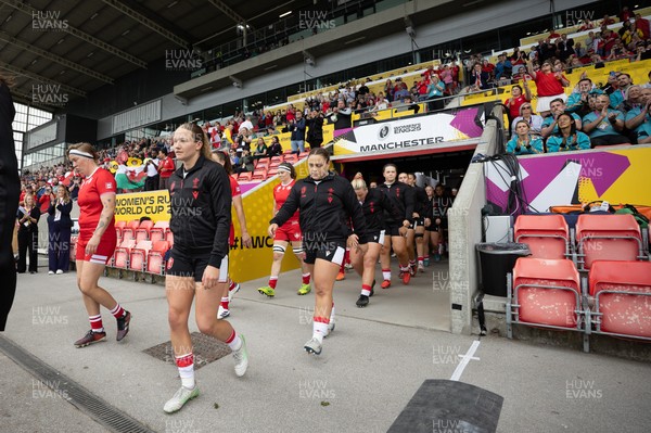 300825 - Canada v Wales, Women’s Rugby World Cup - Carys Cox of Wales and Jenni Scoble of Wales walk out at the start of the match