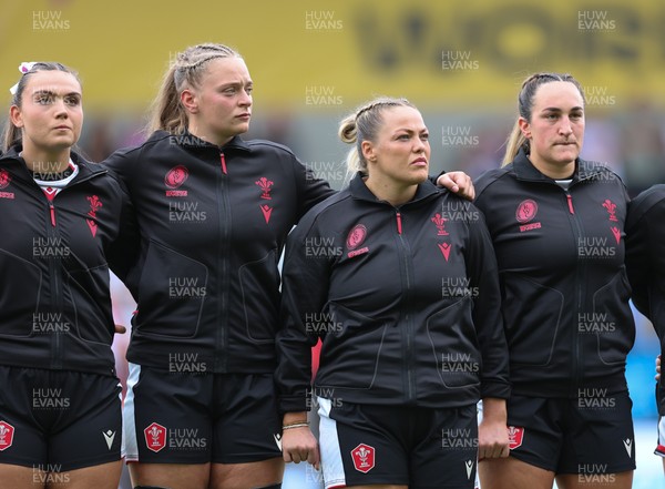 300825 - Canada v Wales, Women’s Rugby World Cup - Left to right, Bryonie King, Tilly Vucaj, Kelsey Jones and Courtney Keight of Wales line up for the anthems