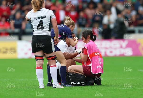 300825 - Canada v Wales, Women’s Rugby World Cup - Gwennan Williams, Wales Women team doctor treats Sisilia Tuipulotu of Wales