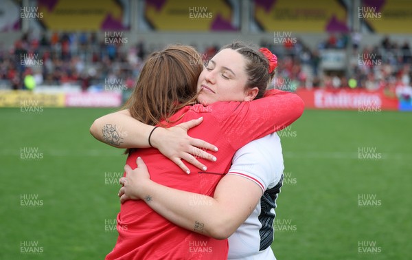 300825 - Canada v Wales, Women’s Rugby World Cup -Gwen Crabb of Wales with Kate Williams at the end of the match