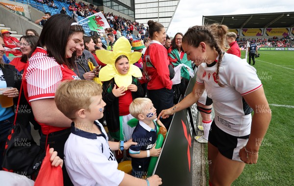 300825 - Canada v Wales, Women’s Rugby World Cup - Wales players with supporters at the end of the match