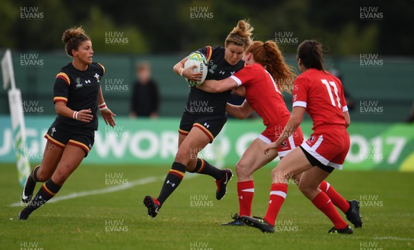 130817 - Canada v Wales - Women's Rugby World Cup - Dyddgu Hywel of Wales in action against Alex Tessier of Canada