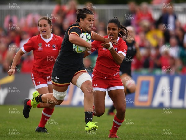 130817 - Canada v Wales - Women's Rugby World Cup - Sioned Harries of Wales in action against Magali Harvey of Canada