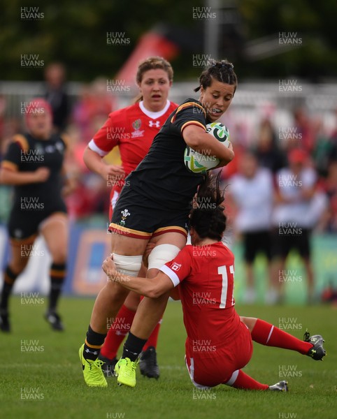 130817 - Canada v Wales - Women's Rugby World Cup - Sioned Harries of Wales in action against Elissa Alarie of Canada