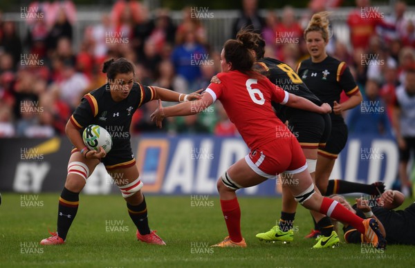 130817 - Canada v Wales - Women's Rugby World Cup - Siwan Lillicrap of Wales in action against Jacey Grusnick of Canada