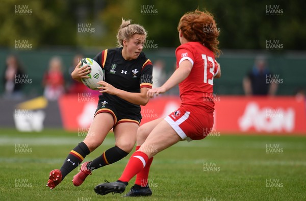 130817 - Canada v Wales - Women's Rugby World Cup - Hannah Jones of Wales in action against Alex Tessier of Canada