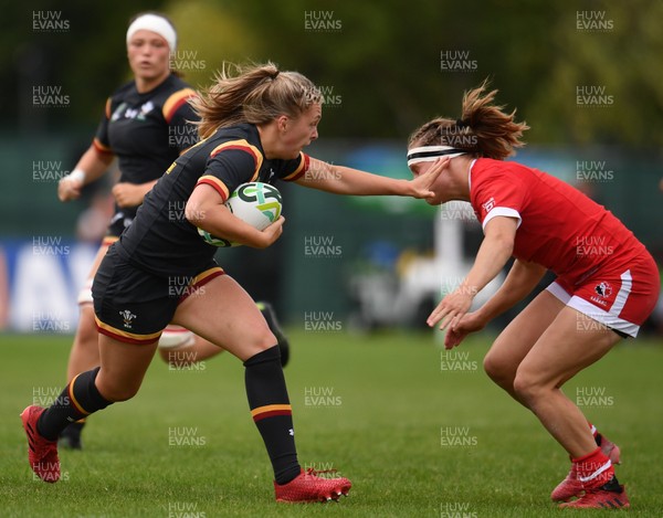 130817 - Canada v Wales - Women's Rugby World Cup - Hannah Jones of Wales in action against Karen Paquin of Canada