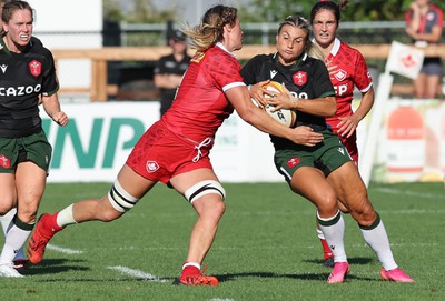 270822 - Canada Women v Wales Women, Summer 15’s World Cup Warm up match - Lowri Norkett of Wales is tackled