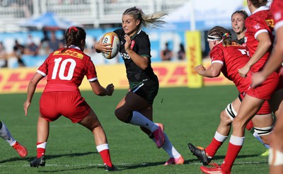 270822 - Canada Women v Wales Women, Summer 15’s World Cup Warm up match - Lowri Norkett of Wales is tackled by Taylor Perry of Canada