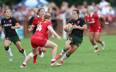 270822 - Canada Women v Wales Women, Summer 15’s World Cup Warm up match - Ffion Lewis of Wales takes on Paige Farries of Canada