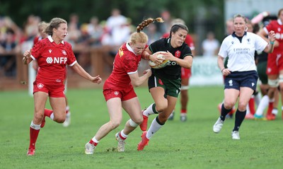 270822 - Canada Women v Wales Women, Summer 15’s World Cup Warm up match - Ffion Lewis of Wales takes on Paige Farries of Canada