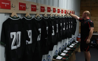 270822 - Canada Women v Wales Women, Summer 15’s World Cup Warm up match - Jamie Cox places the final name plaque on the wall in the changing room