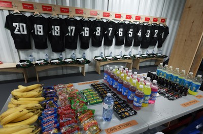 270822 - Canada Women v Wales Women, Summer 15’s World Cup Warm up match - Fuel and energy drinks are laid out along with the  prepared match kit ahead of the teams arrival