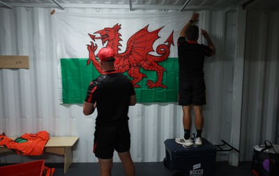 270822 - Canada Women v Wales Women, Summer 15’s World Cup Warm up match - A Welsh flag is put up in the Wales team’s changing room