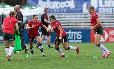 270822 - Canada Women v Wales Women, Summer 15’s World Cup Warm up match - Jasmine Joyce, Ffion Lewis of Wales and Carys Williams-Morris of Wales during warm up