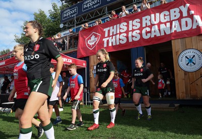 270822 - Canada Women v Wales Women, Summer 15’s World Cup Warm up match - Caitlin Lewis of Wales and Manon Johnes of Wales walk out for the start of the match