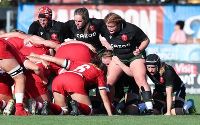 270822 - Canada Women v Wales Women, Summer 15’s World Cup Warm up match - The Wales front row of Donna Rose, Kat Evans of Wales and Cara Hope of Wales prepare to engage in the scrum