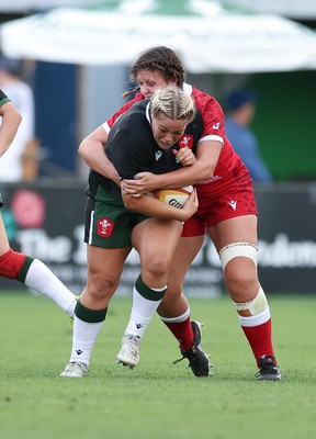 270822 - Canada Women v Wales Women, Summer 15’s World Cup Warm up match - Kelsey Jones of Wales is tackled