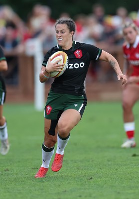 270822 - Canada Women v Wales Women, Summer 15’s World Cup Warm up match - Ffion Lewis of Wales takes on Paige Farries of Canada