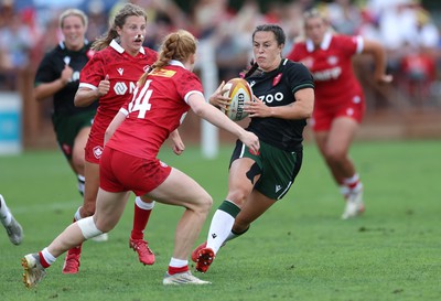 270822 - Canada Women v Wales Women, Summer 15’s World Cup Warm up match - Ffion Lewis of Wales takes on Paige Farries of Canada