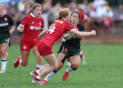 270822 - Canada Women v Wales Women, Summer 15’s World Cup Warm up match - Ffion Lewis of Wales takes on Paige Farries of Canada