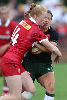 270822 - Canada Women v Wales Women, Summer 15’s World Cup Warm up match - Ffion Lewis of Wales takes on Paige Farries of Canada