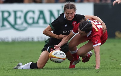 270822 - Canada Women v Wales Women, Summer 15’s World Cup Warm up match - Jasmine Joyce of Wales and Elissa Alarie of Canada compete for the ball