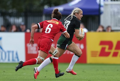 270822 - Canada Women v Wales Women, Summer 15’s World Cup Warm up match - Carys Williams-Morris of Wales gets away from Fabiola Forteza of Canada