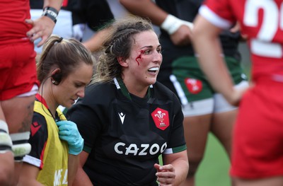 270822 - Canada Women v Wales Women, Summer 15’s World Cup Warm up match - Siwan Lillicrap of Wales receives treatment to an injury