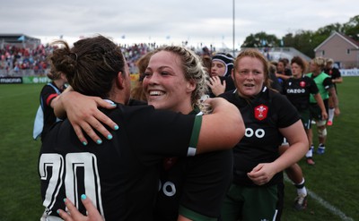 270822 - Canada Women v Wales Women, Summer 15’s World Cup Warm up match - Kelsey Jones of Wales embraces Siwan Lillicrap of Wales at the end of the match