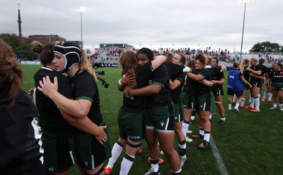 270822 - Canada Women v Wales Women, Summer 15’s World Cup Warm up match - Players embrace each other at the end of the match