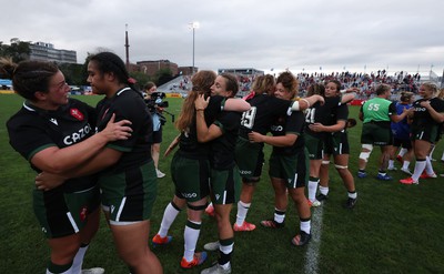 270822 - Canada Women v Wales Women, Summer 15’s World Cup Warm up match - Players embrace each other at the end of the match