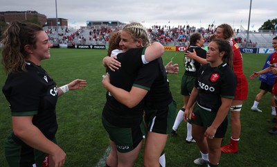 270822 - Canada Women v Wales Women, Summer 15’s World Cup Warm up match - Players embrace each other at the end of the match