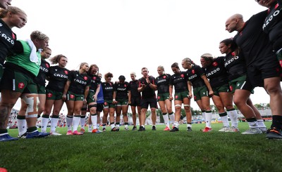 270822 - Canada Women v Wales Women, Summer 15’s World Cup Warm up match - Wales players huddle at the end of the match