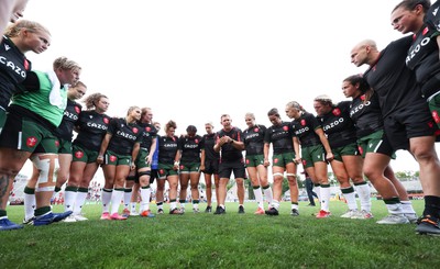 270822 - Canada Women v Wales Women, Summer 15’s World Cup Warm up match - Wales players huddle at the end of the match