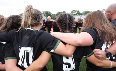 270822 - Canada Women v Wales Women, Summer 15’s World Cup Warm up match - Wales players huddle at the end of the match